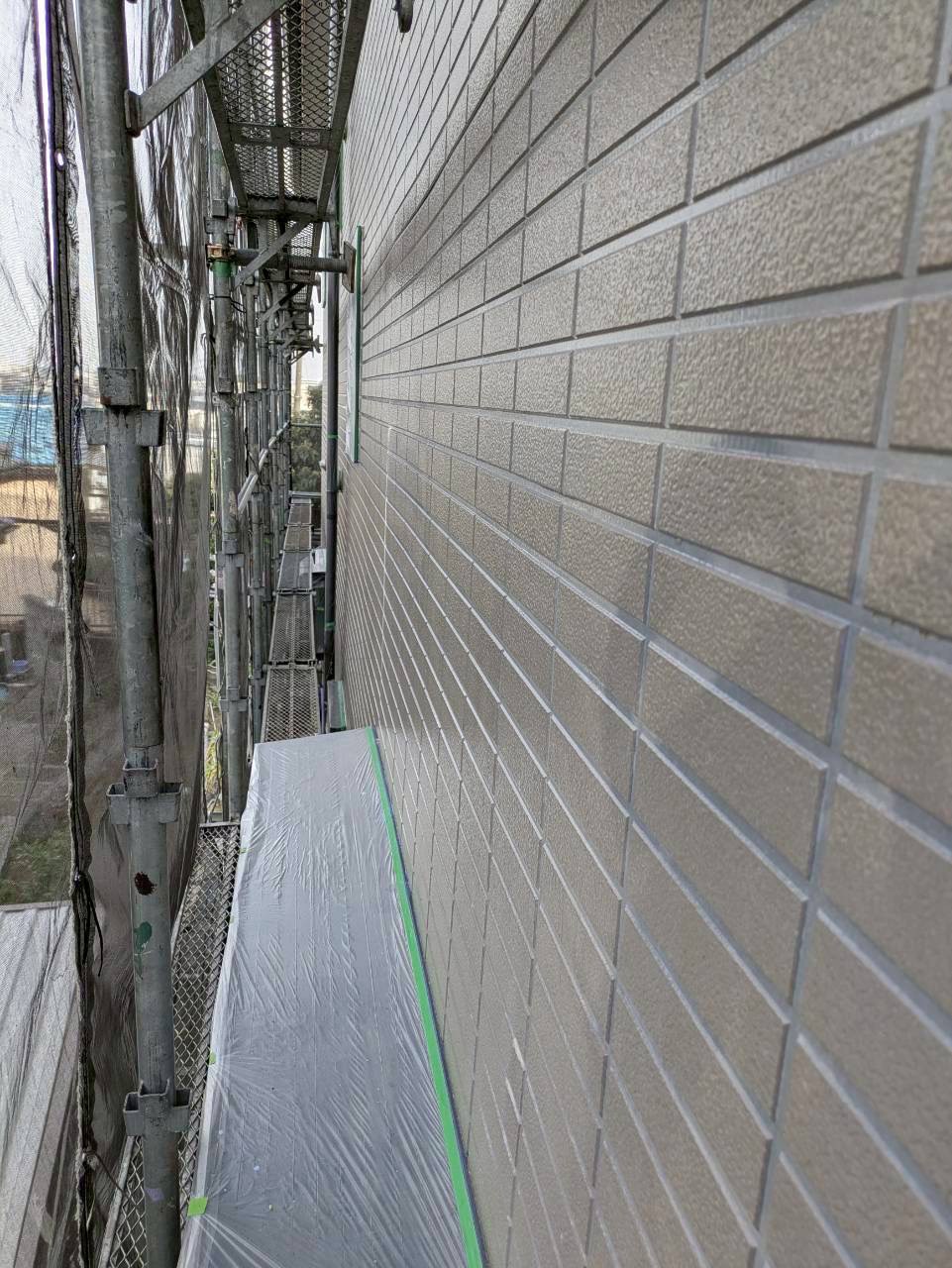 塗装が完了した石目調サイディング